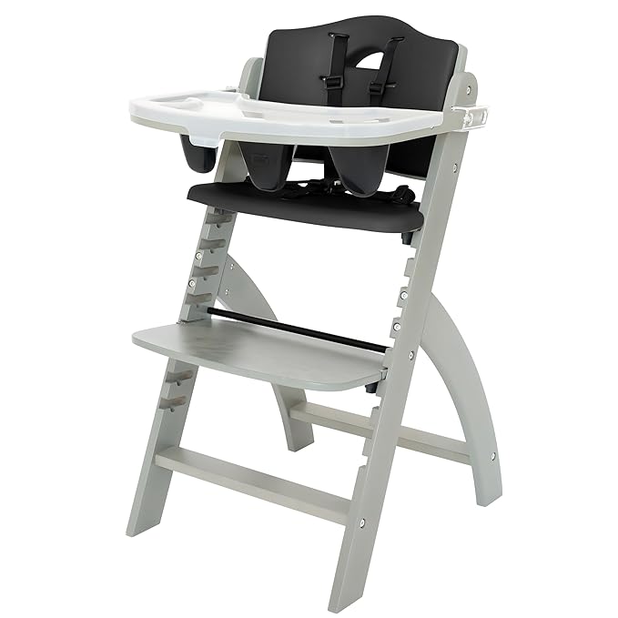 Abiie Beyond Junior Wooden High Chair with Tray - Adjustable and Convertible High Chair for Babies and Toddlers - 6 Months to 250 Lb - Water Resistant - Misty Grey Wood/Black Pearl Cushion