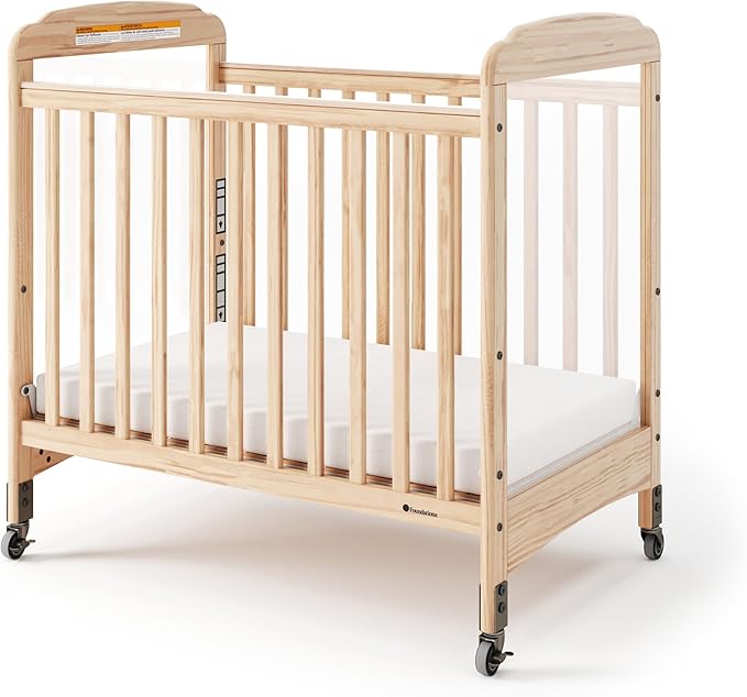 Foundations Serenity Compact Clearview Daycare Crib, Fixed Side, Durable Wood Construction, Adjustable Mattress Board, Clear End Panels. Includes 3” InfaPure Foam Mattress (Natural)